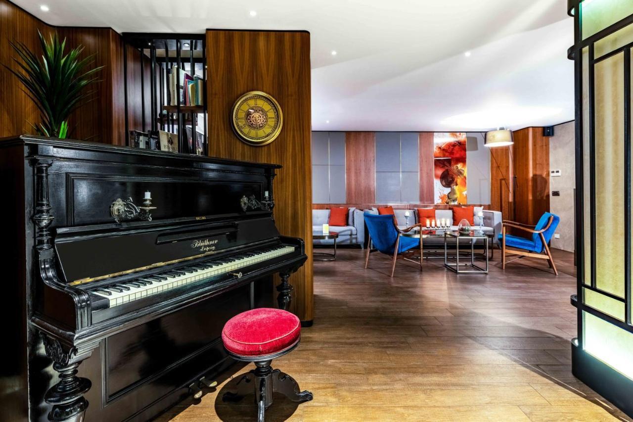 Tzl Suites Hotel Nisantasi İstanbul Dış mekan fotoğraf The piano in the lounge